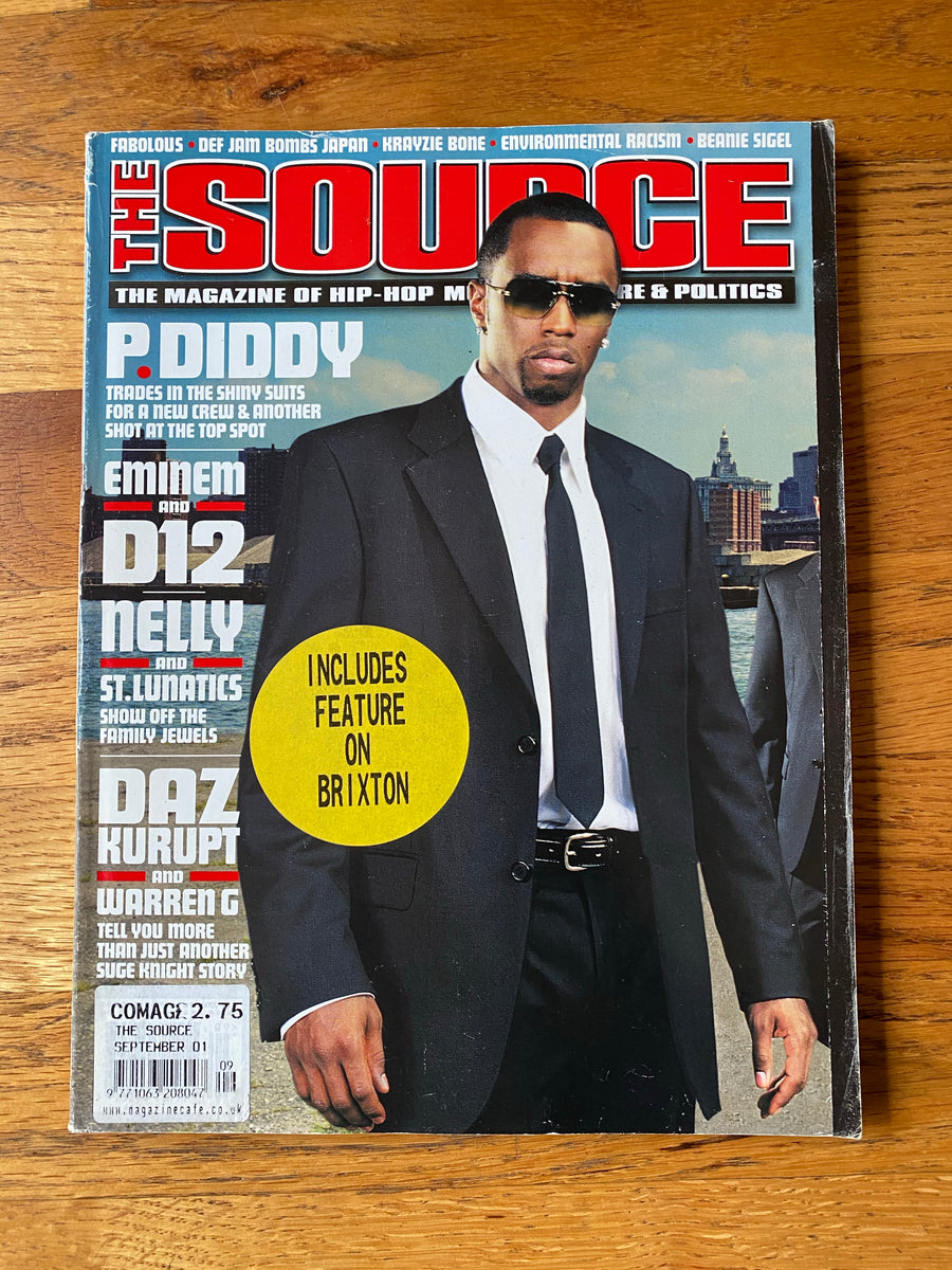 The Source Magazine September 2001 UK edition cover featuring P. Diddy in a black suit, trading the shiny suits for a new crew